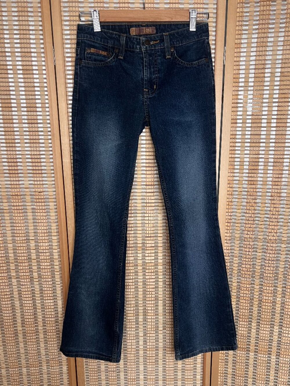 Vintage Y2K LEI low rise flare jeans in a dark wash denim size 0